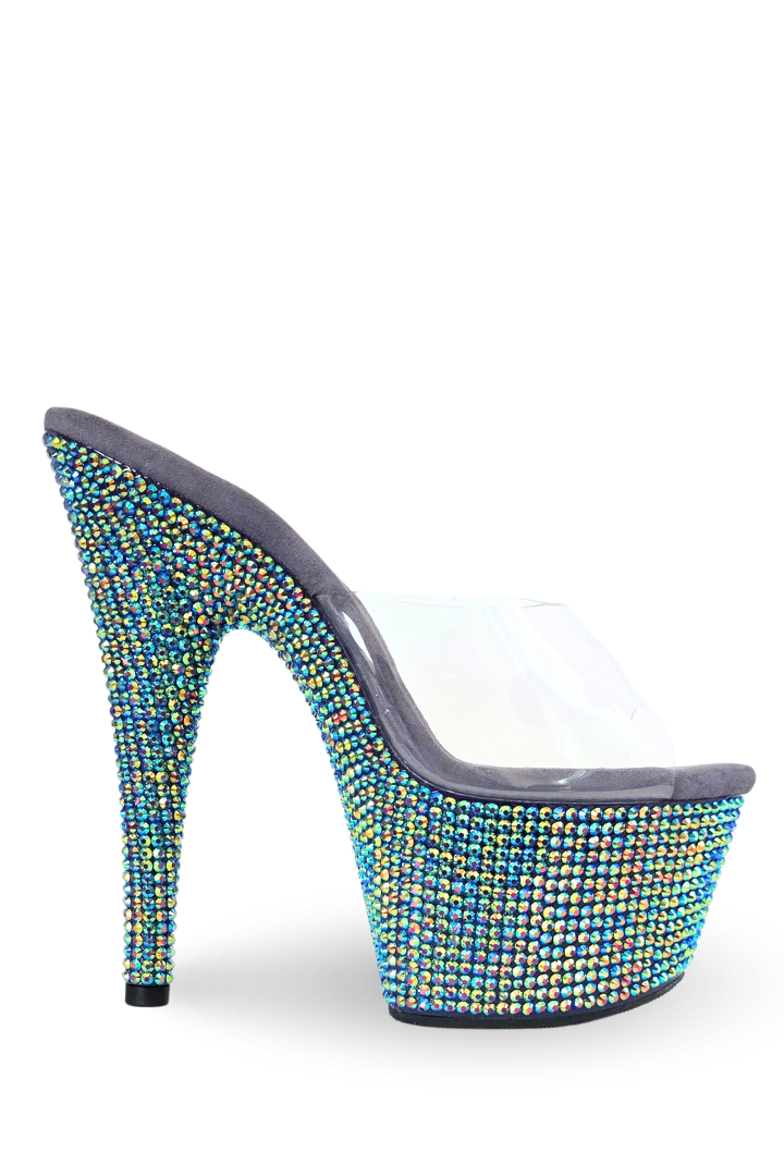 High-heeled shoe with colorful bead embellishments on a white background
