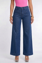 Blue jeans worn by a person on a white background