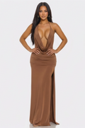 Woman wearing a brown evening gown on a white background
